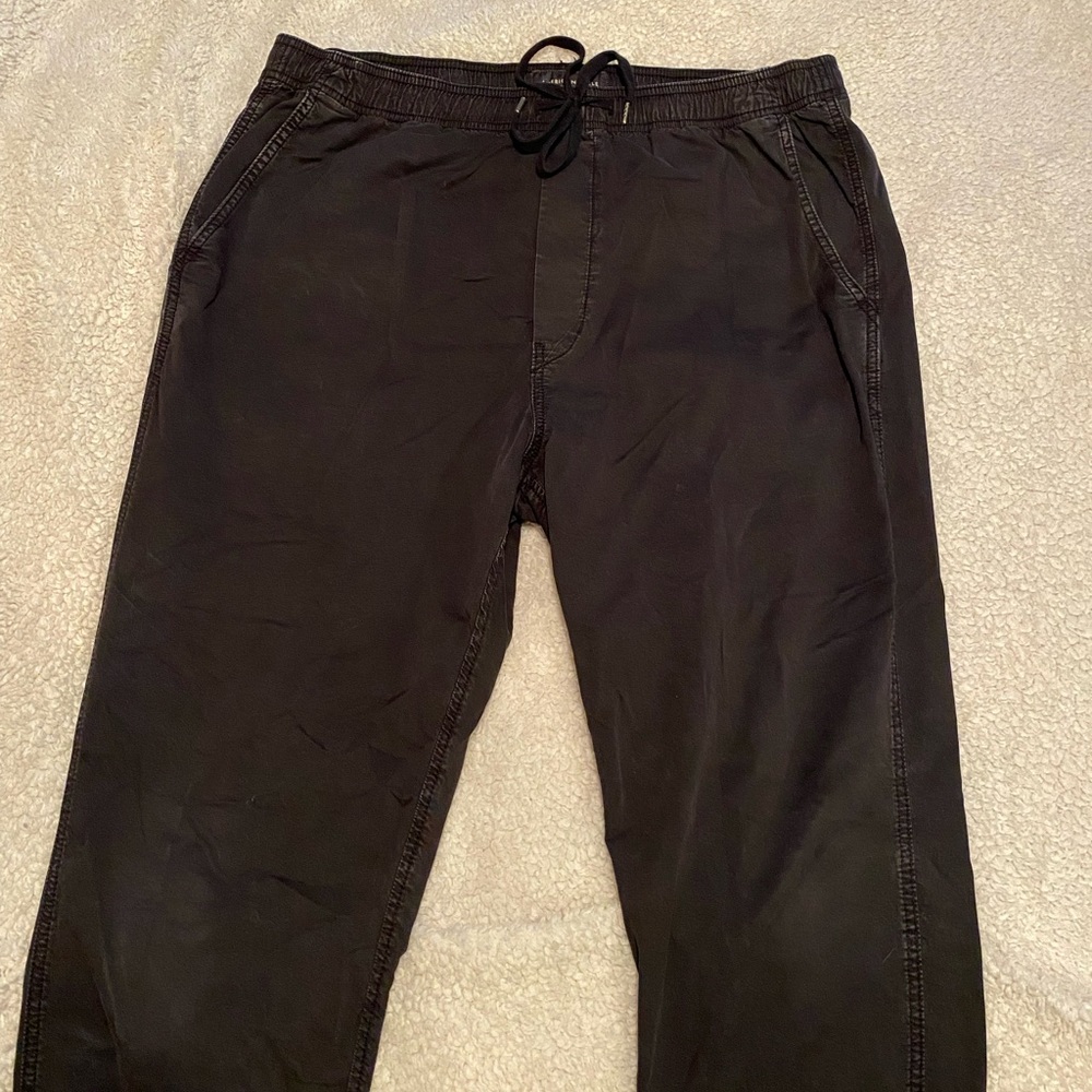 Large black American Eagle joggers